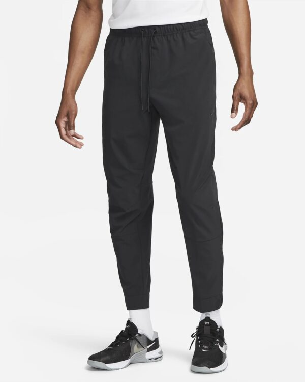 Штани Nike Dri-Fit Unlimited Tapered Leg Versatile Training Pants FB7548-010